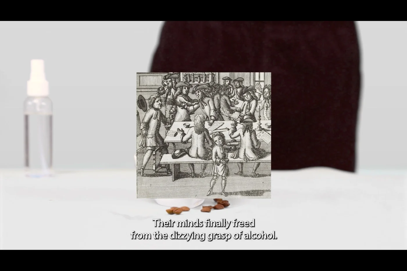 Still from video essay showing a drawing of a lively room of men in an early modern European context.
